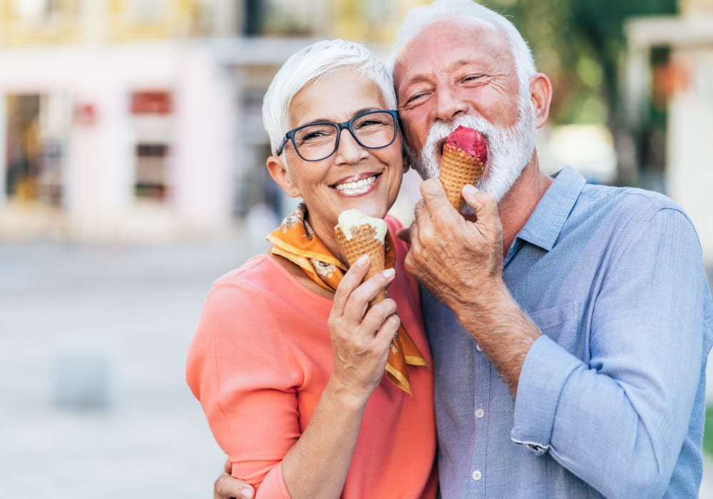 Couple eating ice cream together near Ray Stone Senior Living in Sacramento, California
